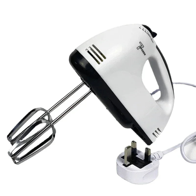 Hand mixer with attachments and plug on a white background