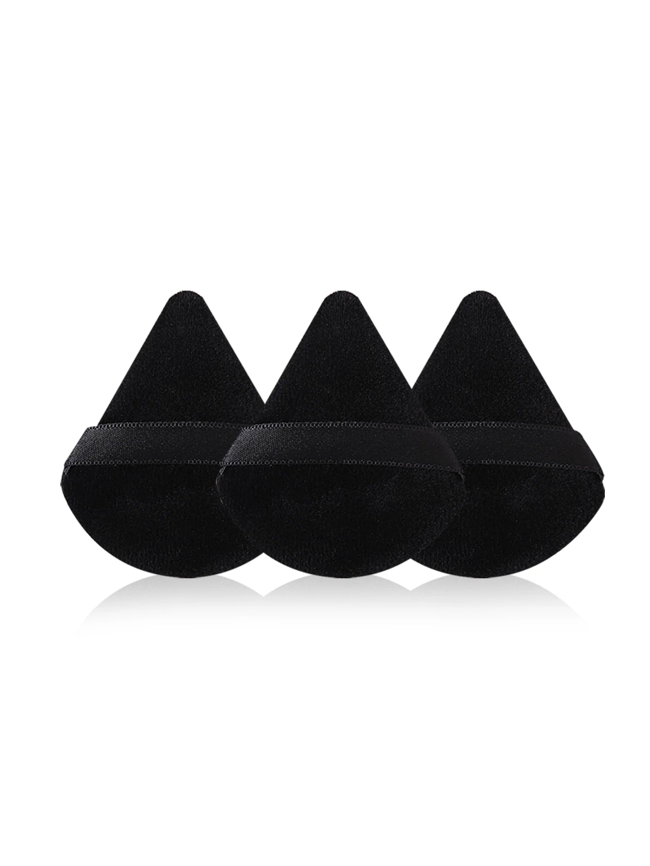 Three black triangular earbud tips on a white background