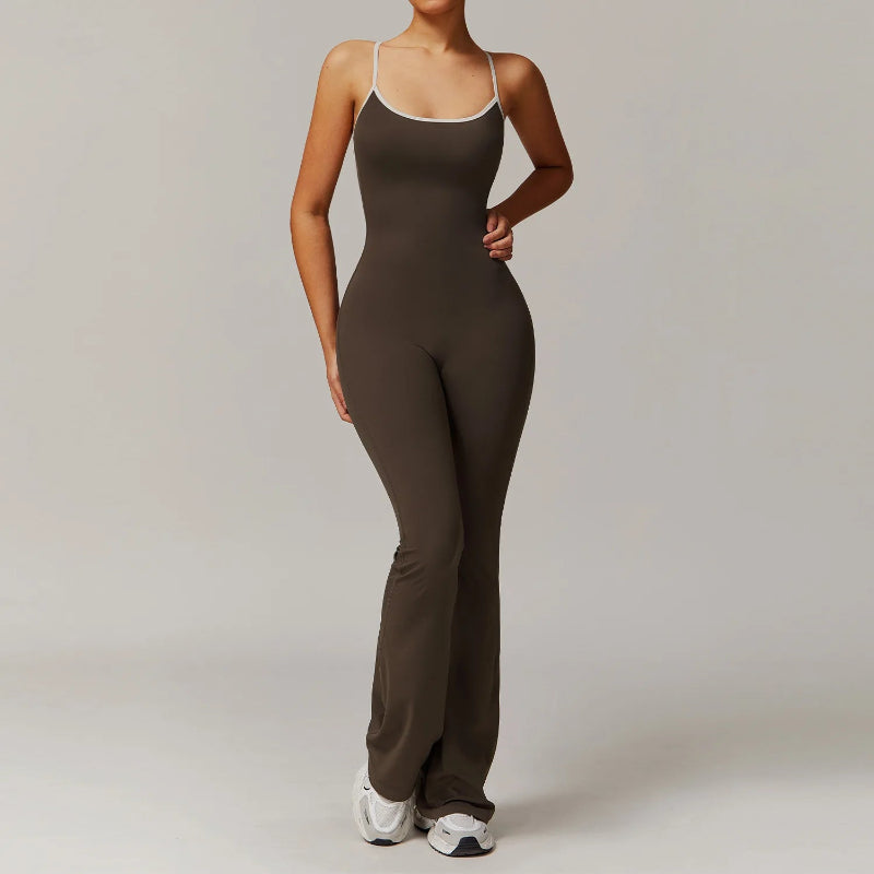 Person wearing a brown jumpsuit on a plain background