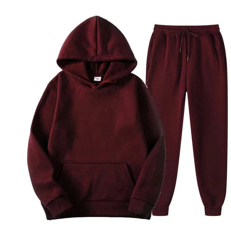 Maroon hoodie and pants set on a white background