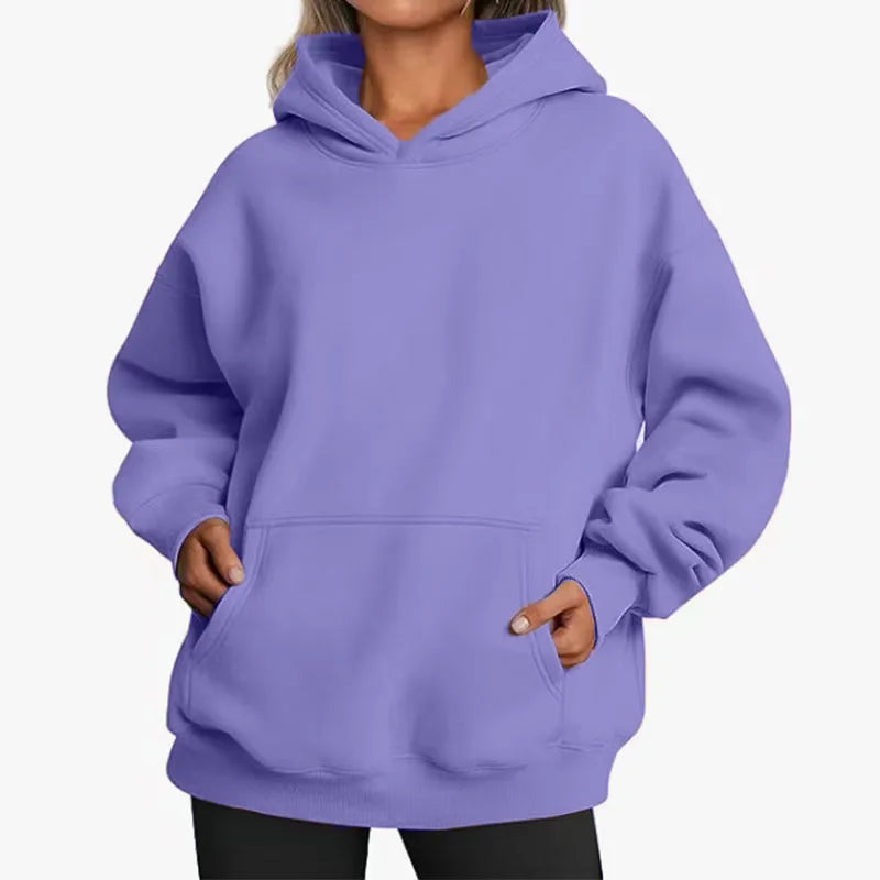 Purple hoodie worn by a person on a white background
