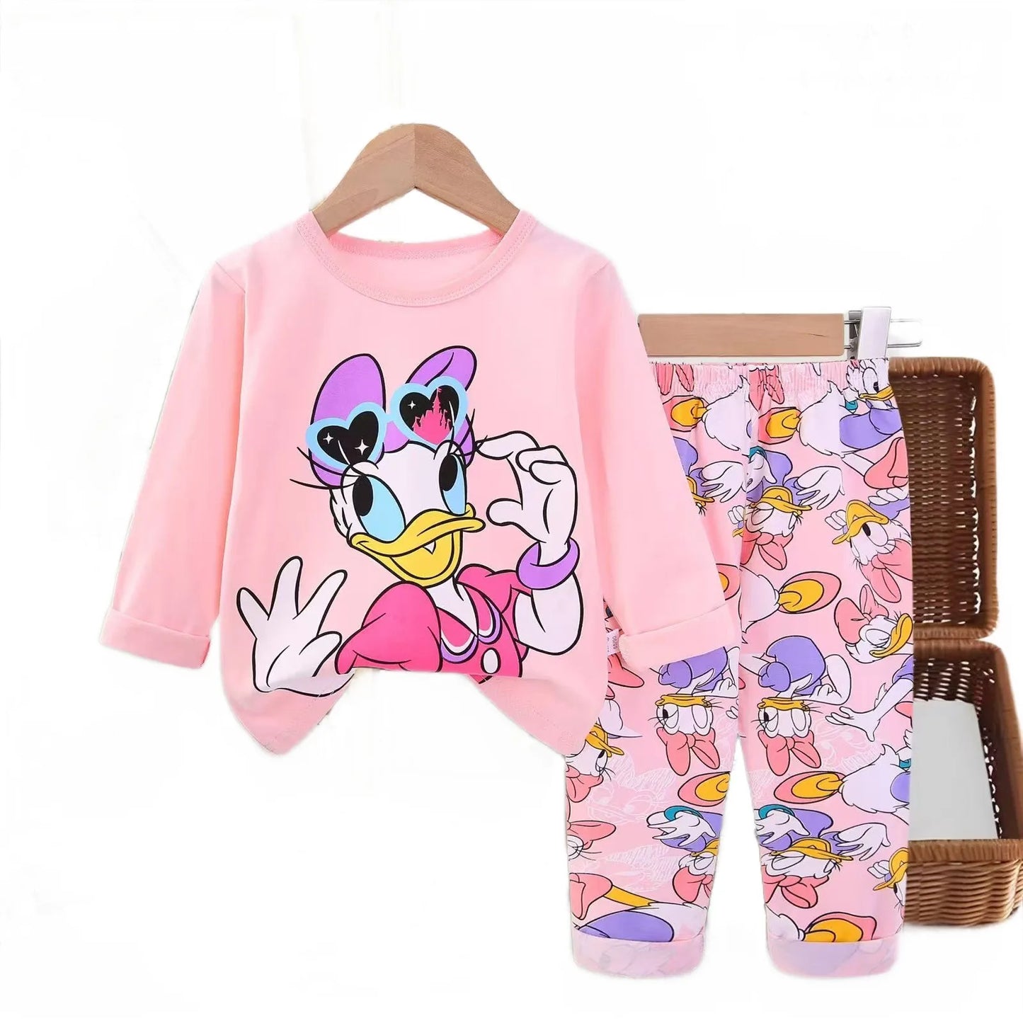 Children's pajama set with cartoon character on pink background