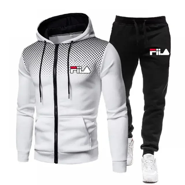 White hoodie with black accents and black pants with Fila logo on a white background