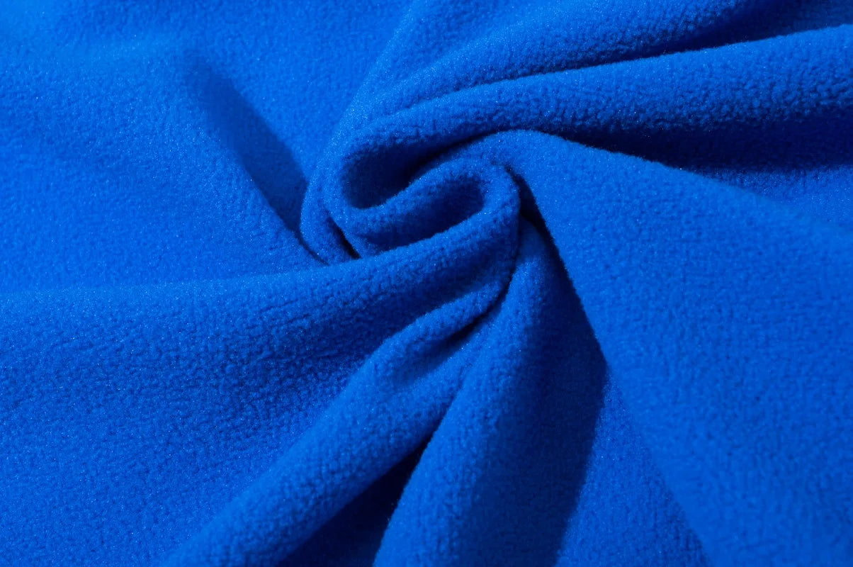 Close-up of blue fabric with folds