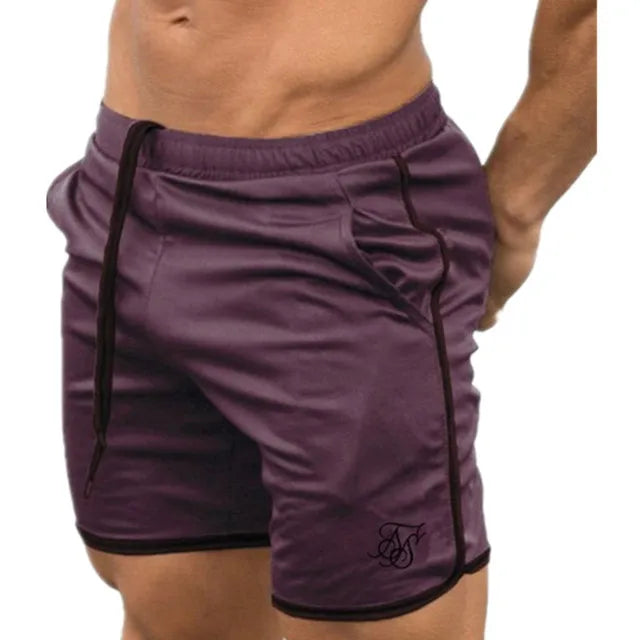 Purple shorts with black trim on a white background