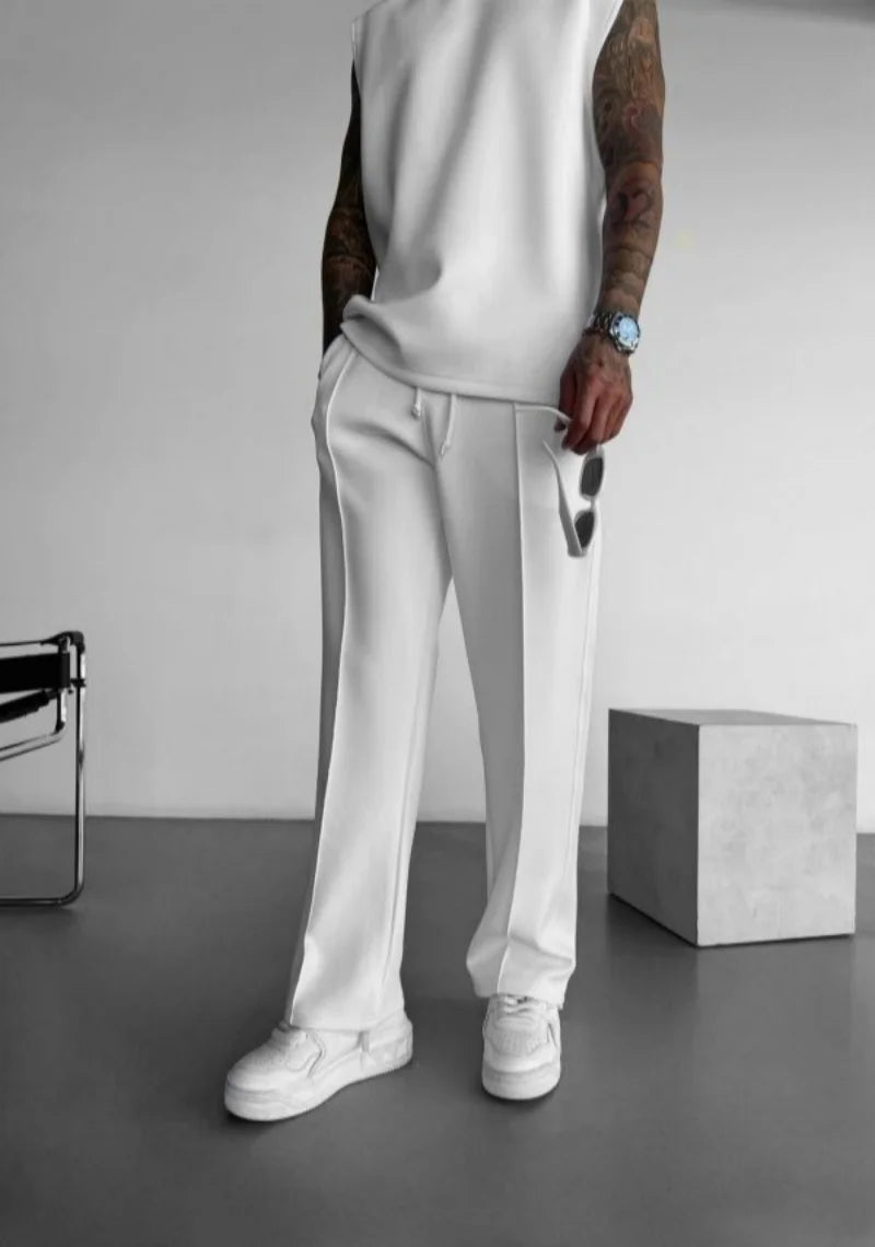 Men’s casual solid-color pants with elastic waist, drawstring closure, and side pockets white