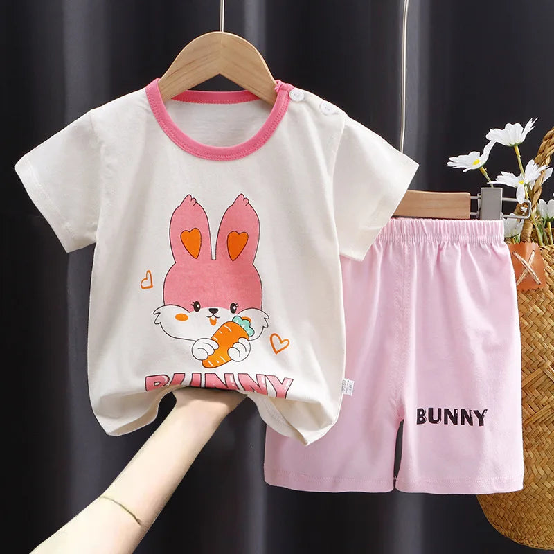 A soft and breathable baby girl pajama set, perfect for newborns and toddlers up to 3 years old 8