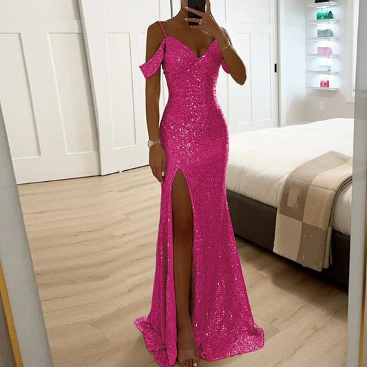 Person wearing a pink sequin dress in a bedroom setting