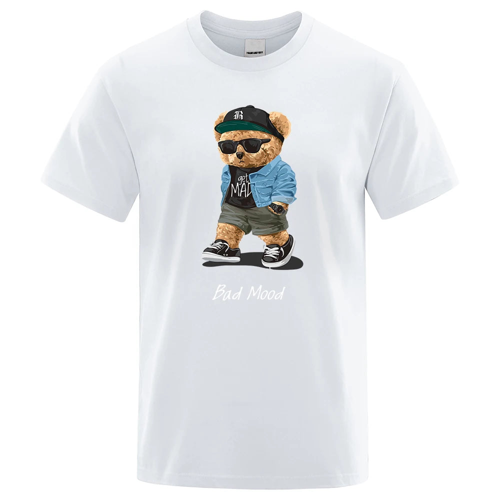 White t-shirt with a bear graphic wearing sunglasses and a cap on a white background