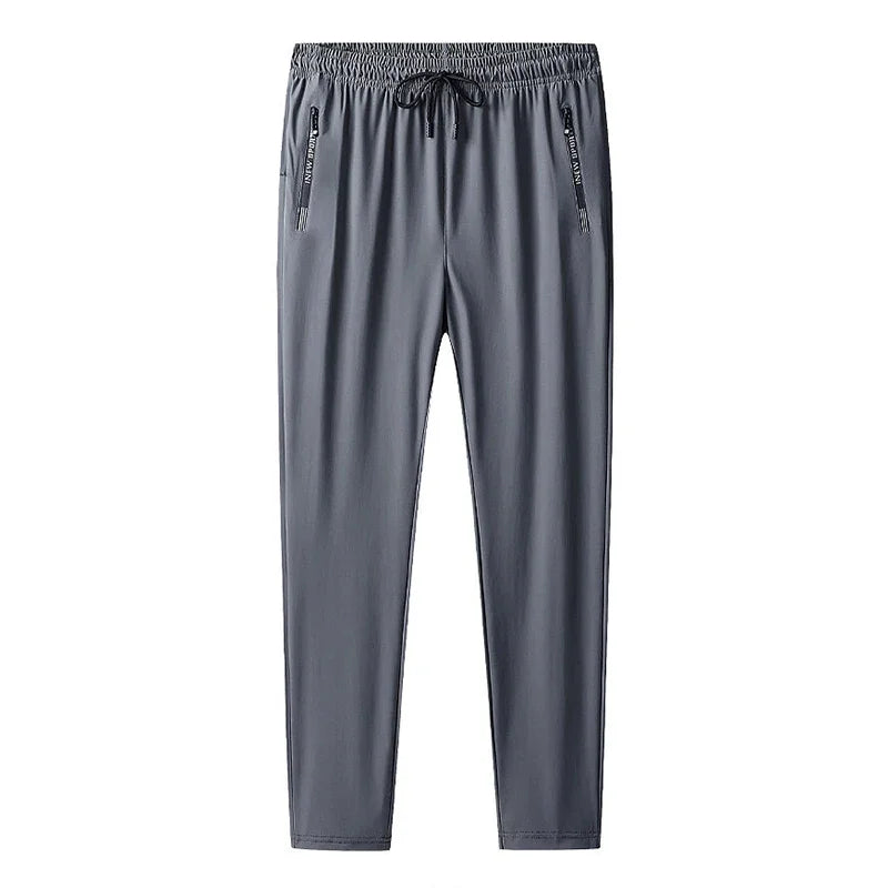 Gray pants with drawstring on a white background