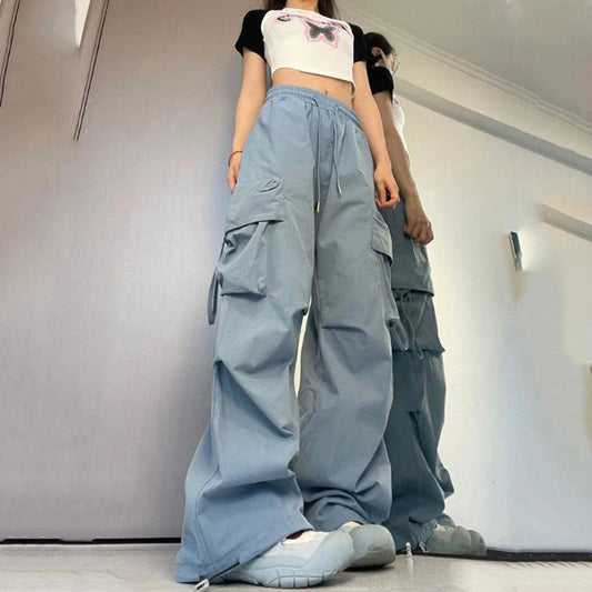 Trendy women’s Y2K cargo pants with oversized pockets, drawstring waist, and a baggy streetwear