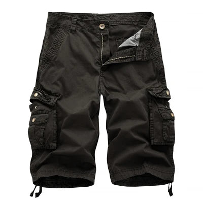 Black cargo shorts on a light gray background