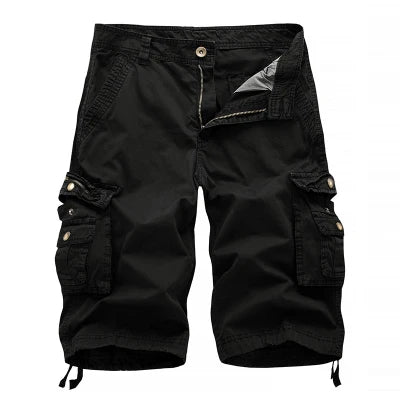Black cargo shorts on a light gray background