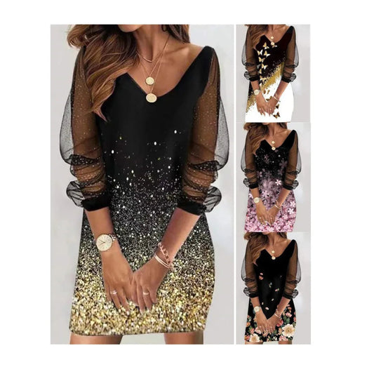 Black and gold dress with sheer sleeves and glittery skirt