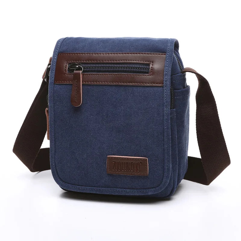 Blue shoulder bag with brown accents on a white background