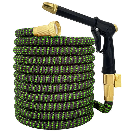 Green and black garden hose with a spray nozzle on a white background
