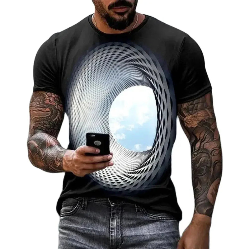 Man wearing a black t-shirt with a unique design, holding a phone.