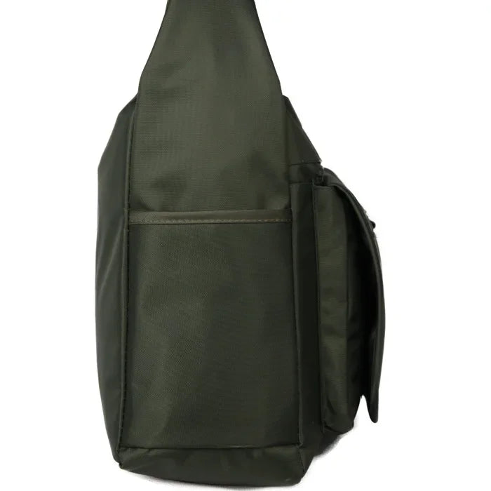 Green sling bag on a white background