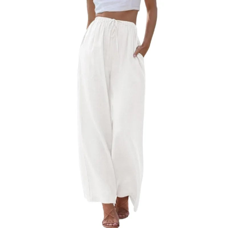White wide-leg pants worn by a person on a white background
