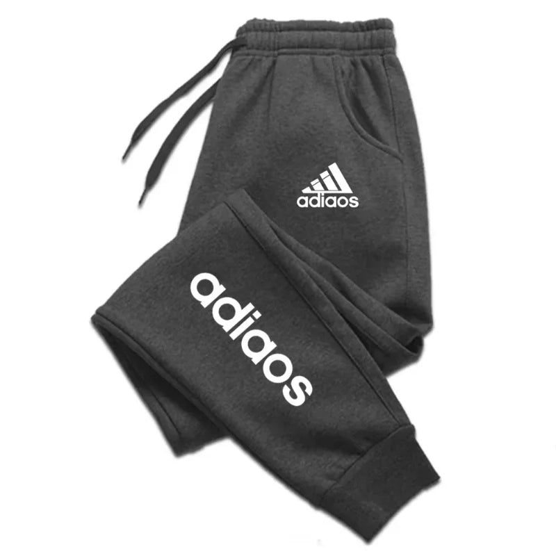 Gray Adidas tracksuit on a white background