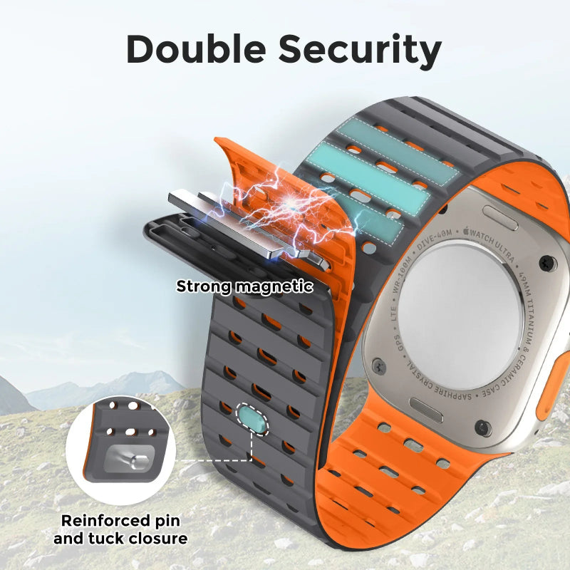 Smartwatch with orange and gray strap featuring magnetic attachment and closure details.