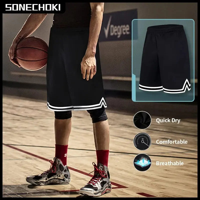Person holding a basketball wearing black shorts with white trim on a basketball court, featuring SONECHOKI branding.