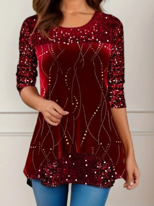 Red sequin top worn by a person on a plain background