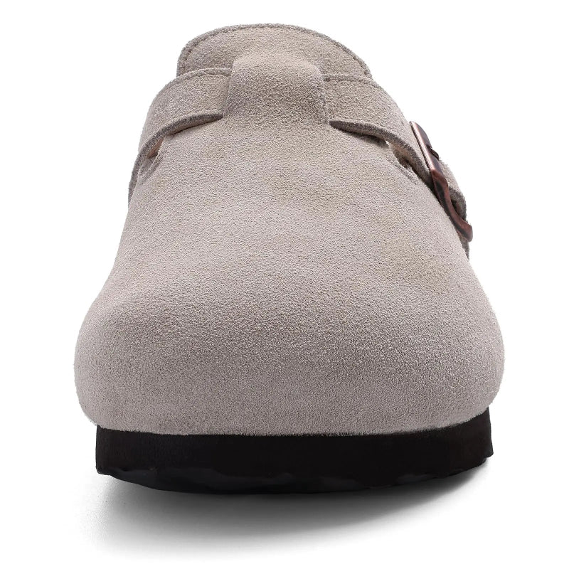Gray suede shoe with a buckle on a white background