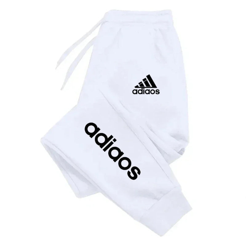 White drawstring bag with 'adidas' logo on a white background