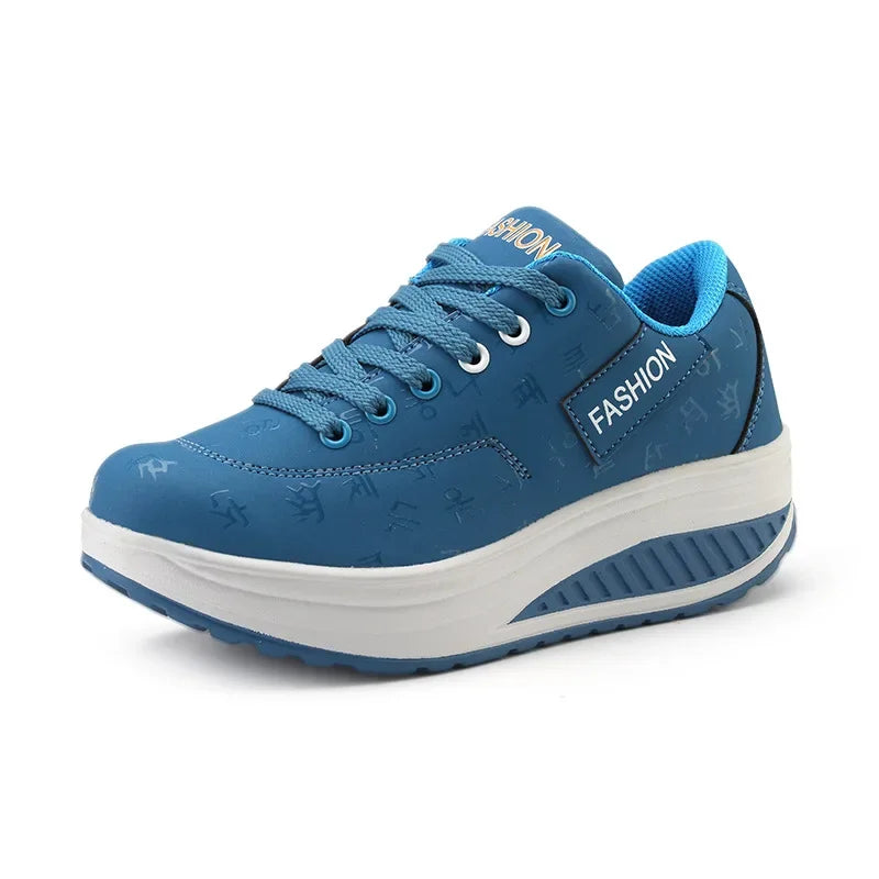 Blue sneaker with white sole on a white background