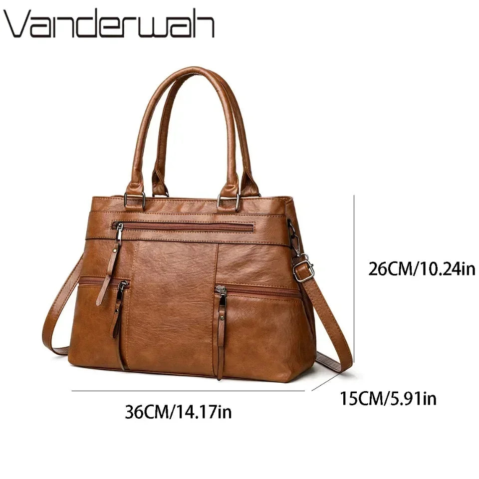 Brown handbag with measurements on a white background, featuring the brand 'Vanderwah'.