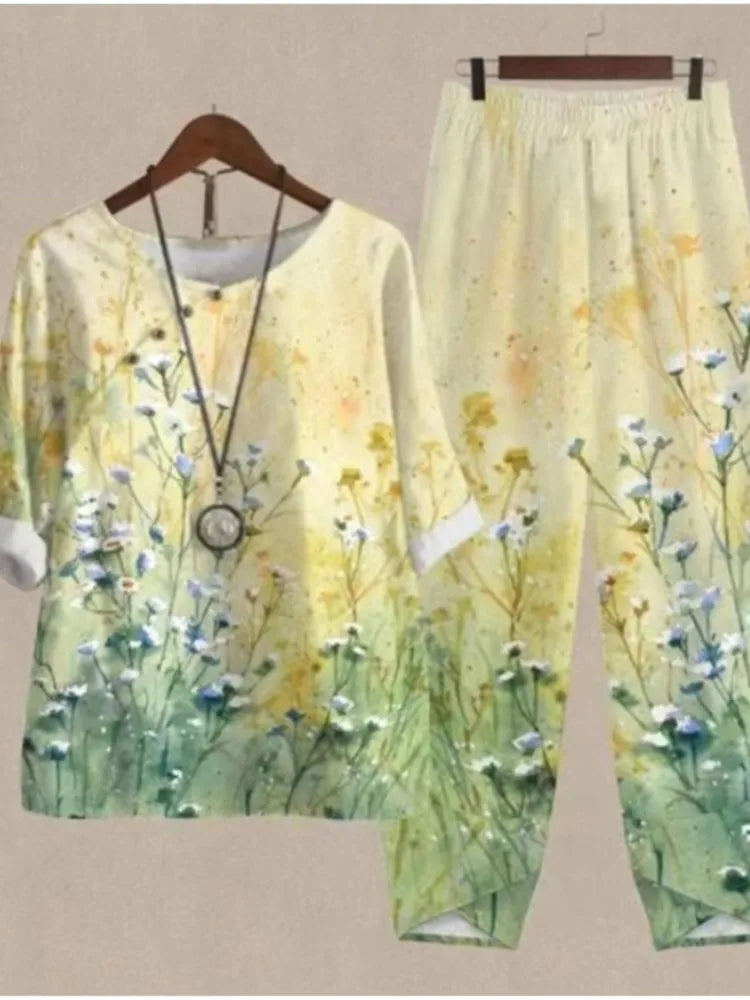 Floral print outfit on a hanger against a neutral background