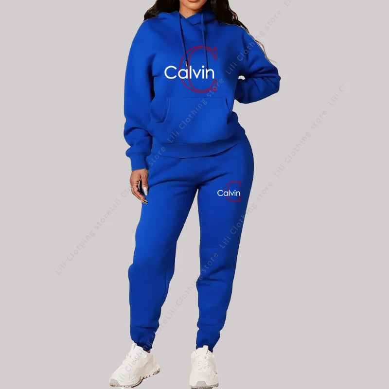 Blue Calvin  tracksuit worn by a person on a gray background