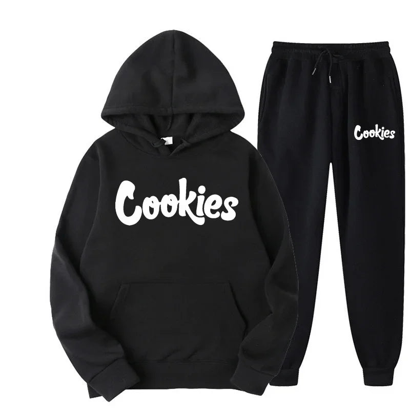 Black hoodie and jogger pants set with 'Cookies' branding on a white background