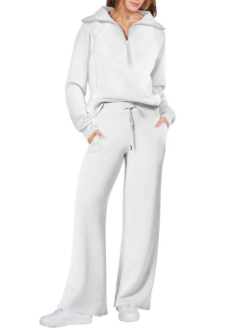 Person wearing a white tracksuit on a white background