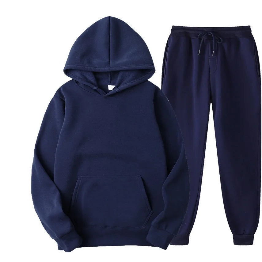 Navy blue hoodie and jogger pants set on a white background