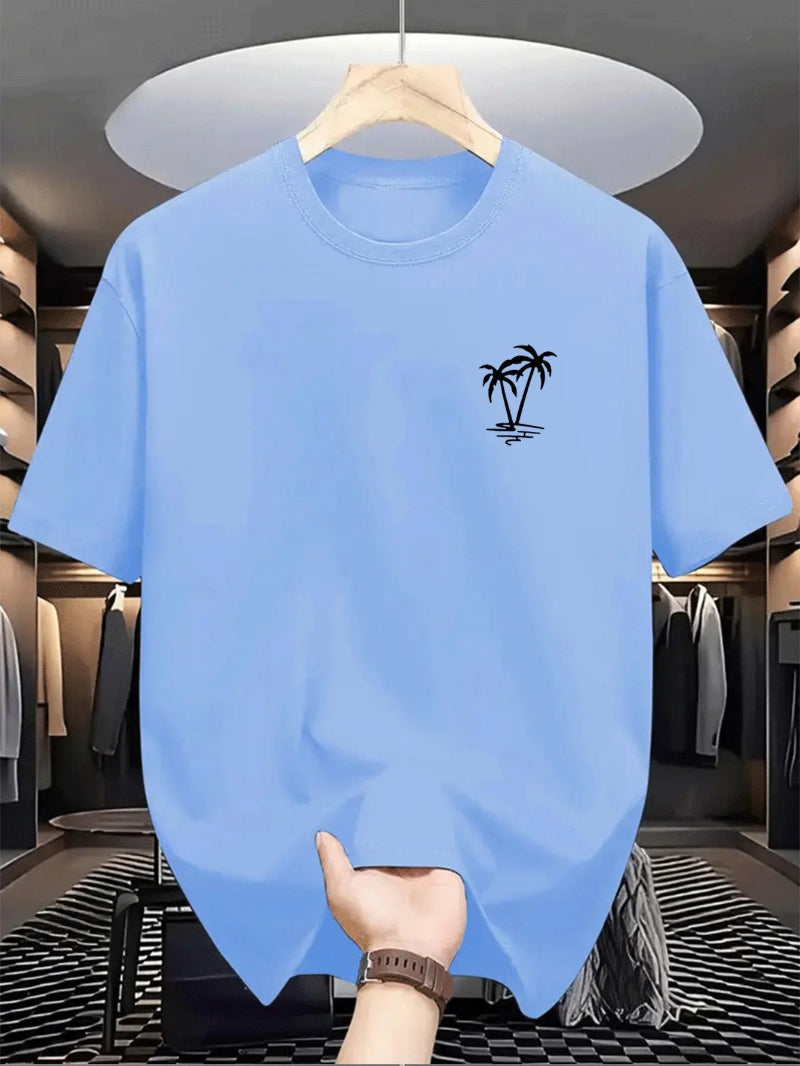 Light blue t-shirt with a black palm tree design on a hanger in a clothing store.
