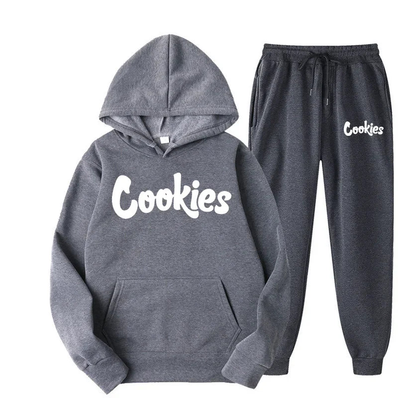 Gray hoodie and jogger pants set with 'Cookies' branding on a white background