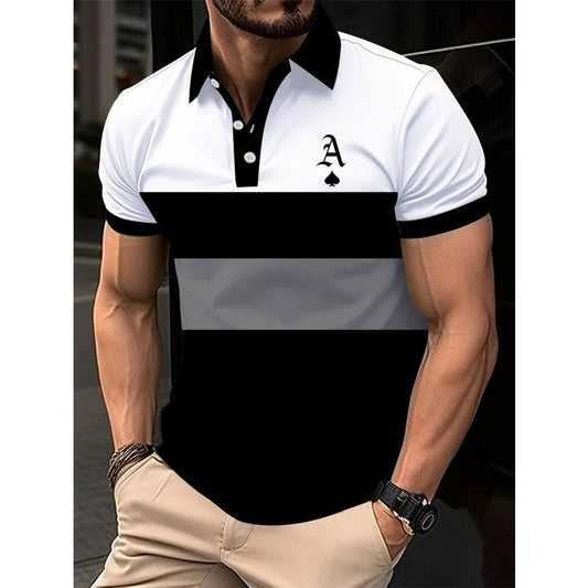 A man wearing a black, white, and gray striped polo shirt with a spade symbol on the chest, short sleeves, and a lapel collar.