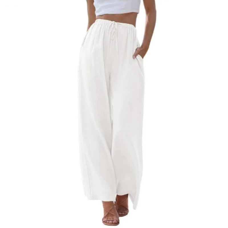 White wide-leg pants worn by a person on a white background