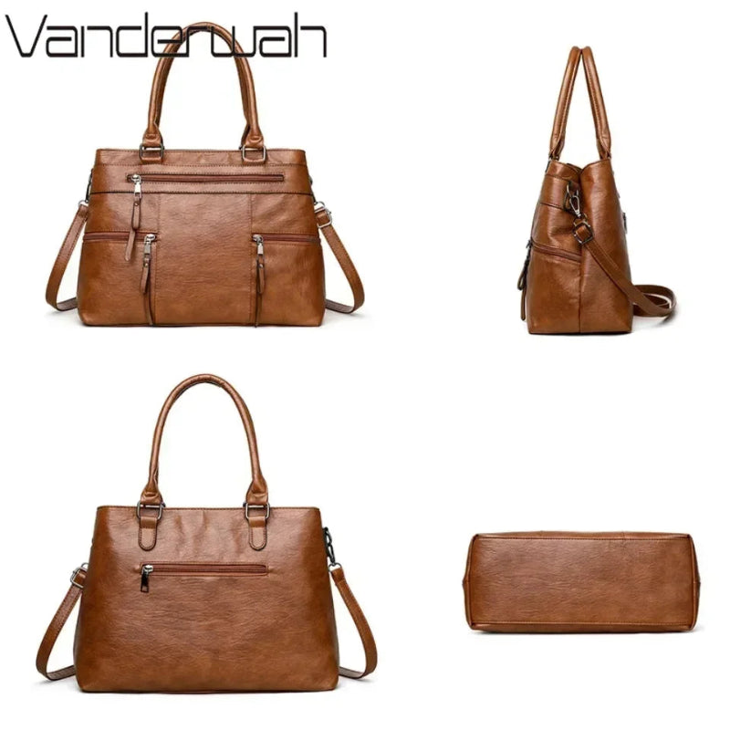 Brown handbags and clutch from Vanderwall on a white background