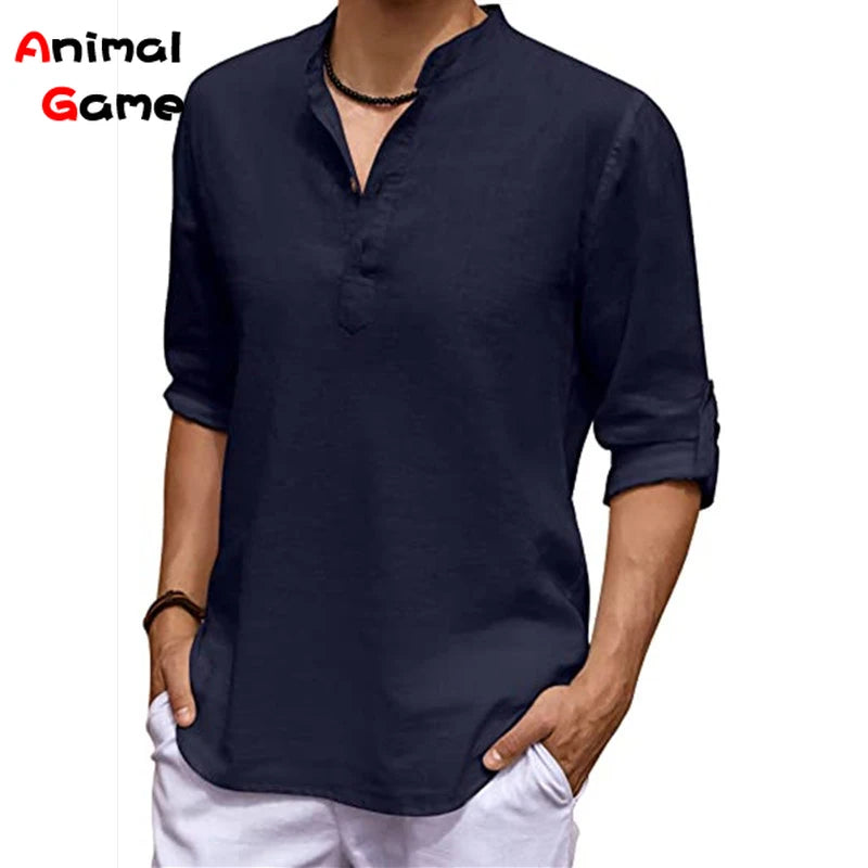 Person wearing a dark blue shirt with rolled-up sleeves on a white background