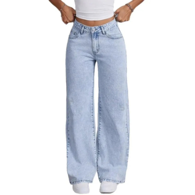 Light blue jeans worn by a person on a white background