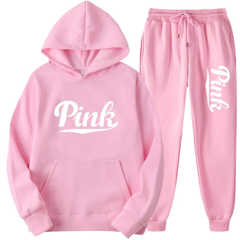 Pink hoodie and jogger set with 'Pink' text on a white background