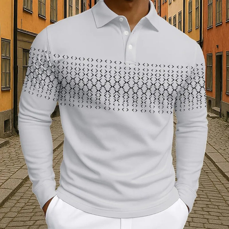 White long-sleeve shirt with geometric pattern on sleeves against a blurred street background