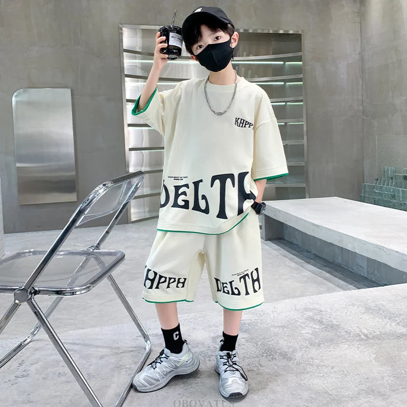 Person wearing a stylish outfit with text on clothing in an indoor setting