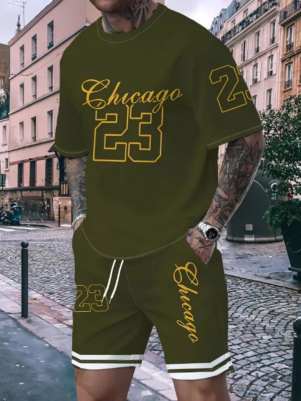 Person wearing a green 'Chicago 23' t-shirt and shorts set on a city street.