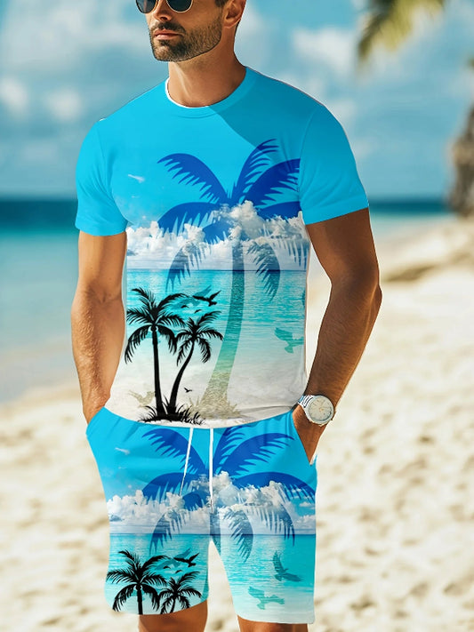 Man wearing a blue and white tropical-themed shirt and shorts on a beach.