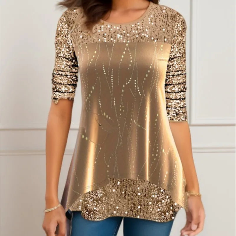 Gold sequin top worn by a person with a neutral background