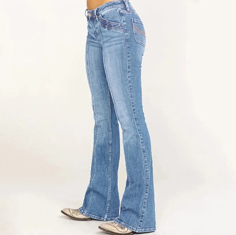 Blue jeans worn by a person on a white background